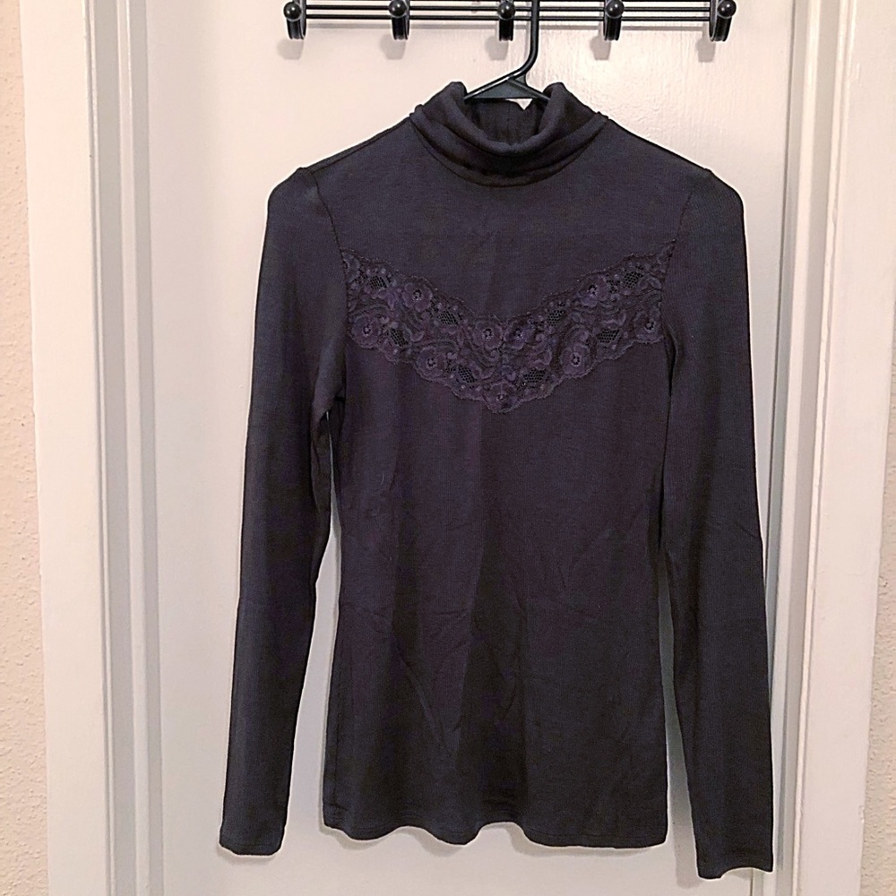 Moda International classy and sexy turtleneck top!